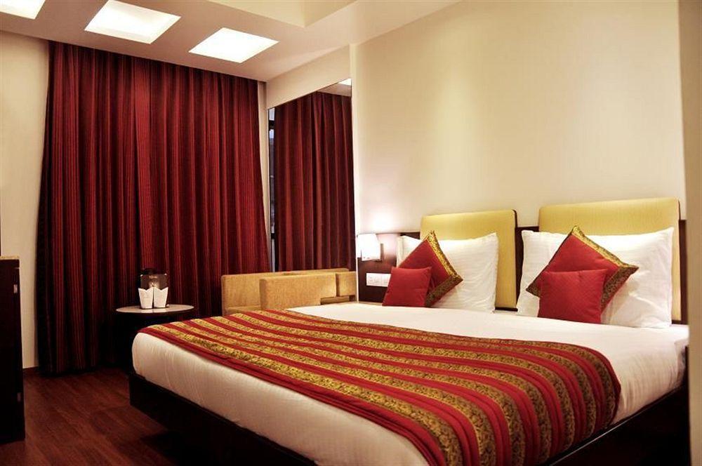 Отель The Prime Balaji Deluxe At New Delhi Railway Station - Free Airport Pickup Номер фото