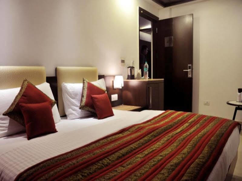 Отель The Prime Balaji Deluxe At New Delhi Railway Station - Free Airport Pickup Номер фото